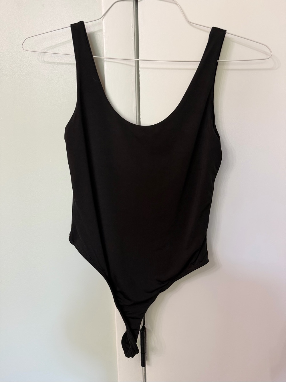 Sleek Black Scoop Neck Bodysuit for Women